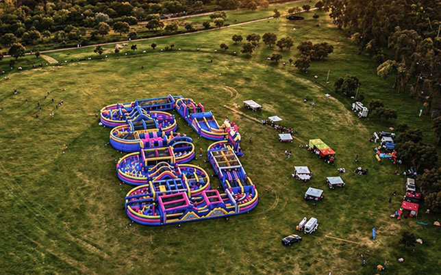 The Gauntlet at James & Ethel Gray Park amilies enjoying The Gauntlet inflatable obstacle course at James & Ethel Gray Park in Melrose, Johannesburg