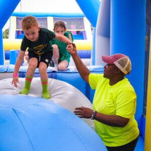 Controlled entry and participant flow at The Gauntlet obstacle course during an event